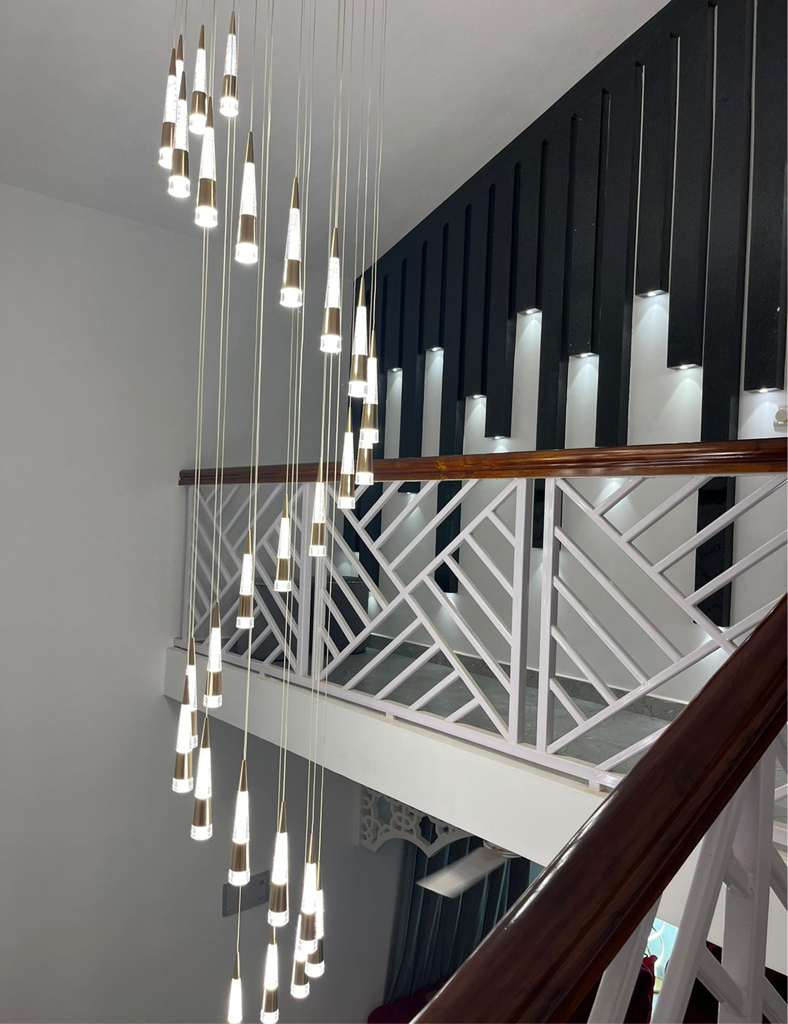 Modern pendant lighting and staircase details